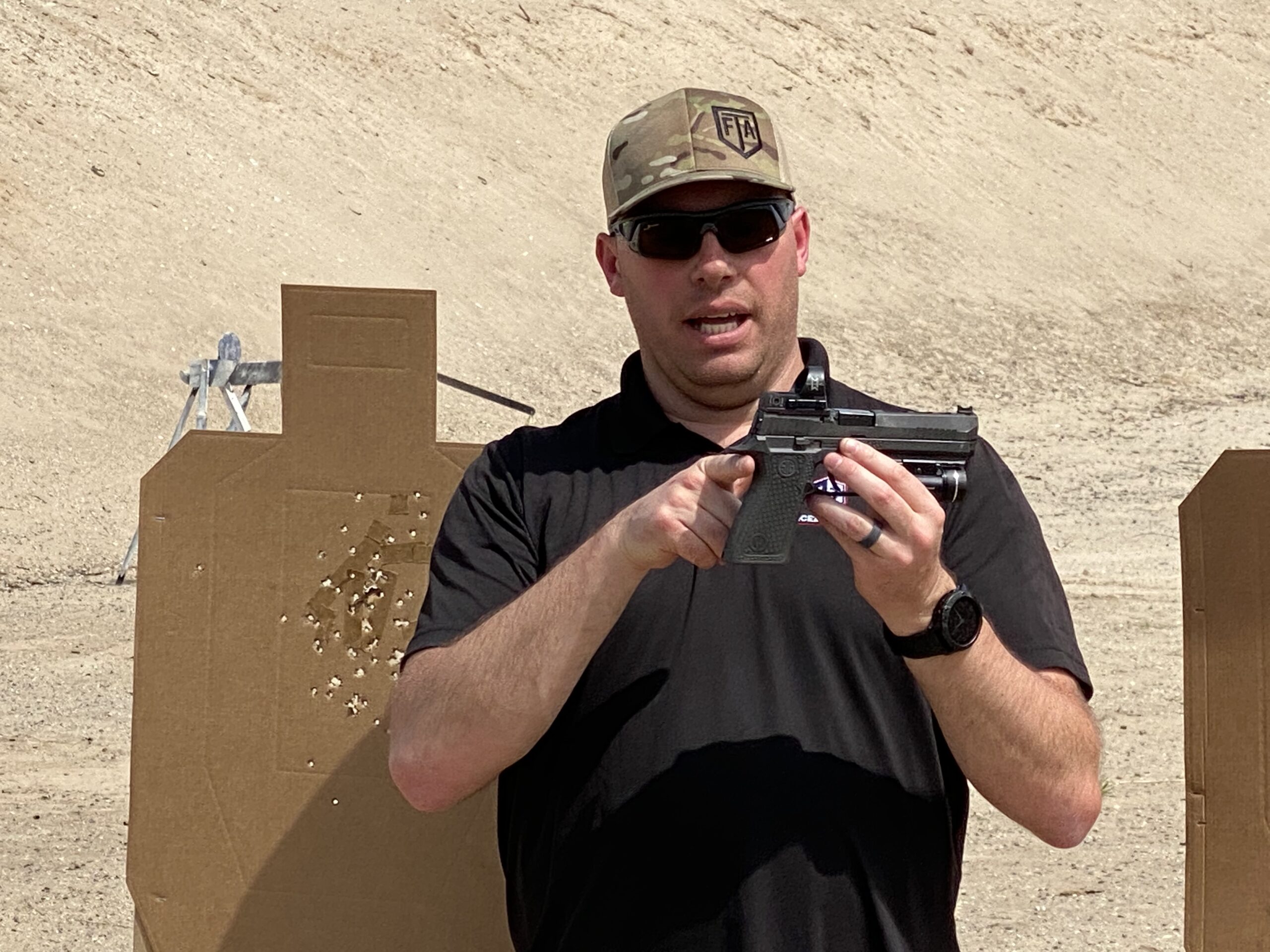 Riley Bowman Teaching About Grip in Pistol Intelligence Class